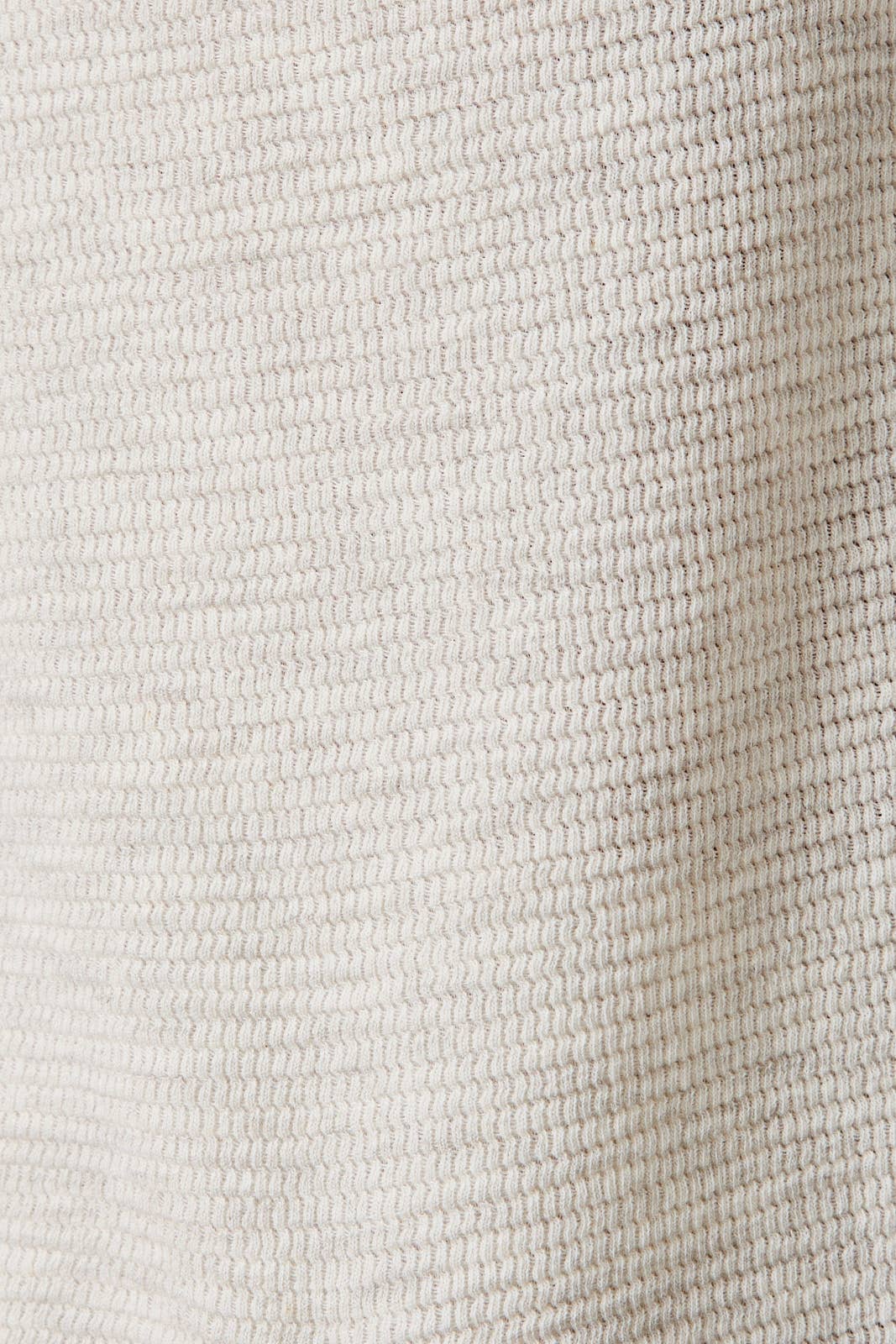 Close-up of textured beige fabric