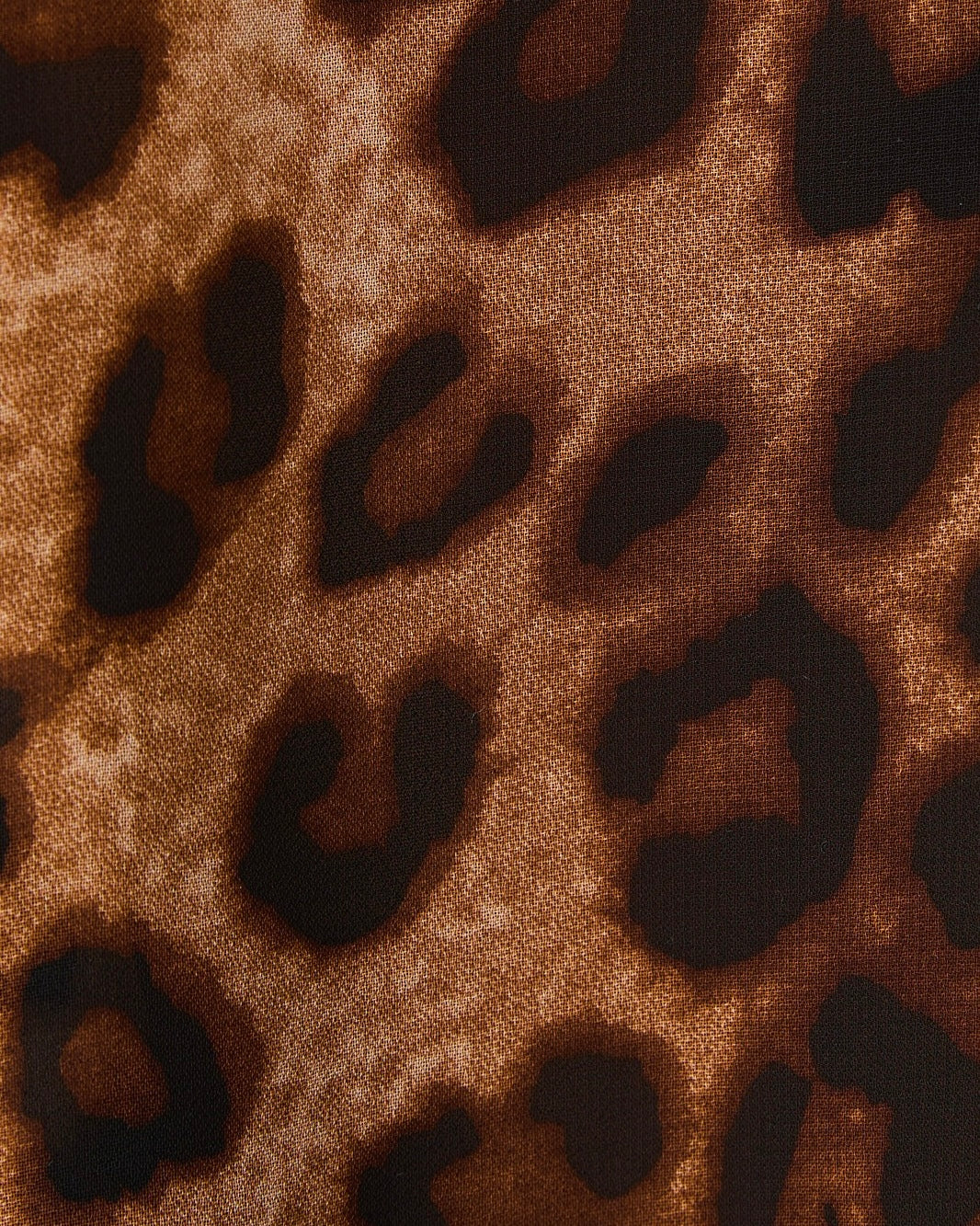 Oversized Pleated Animal Print Top - Blackbird Boutique