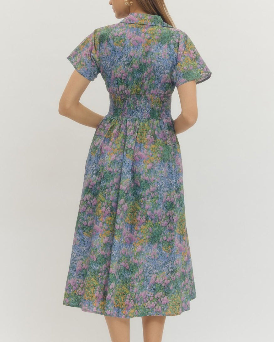 Woman wearing a floral dress on a white background