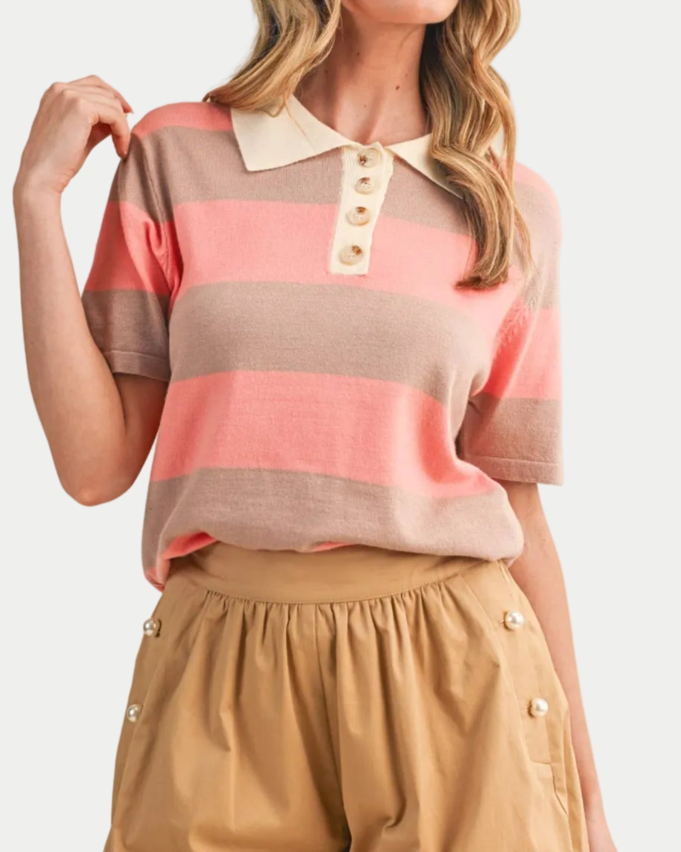 Avery Striped Sweater Knit Top in coral sand. Perfectly soft for school, running errands, weekend wear, casual days. Featured on a model with a neutral background.