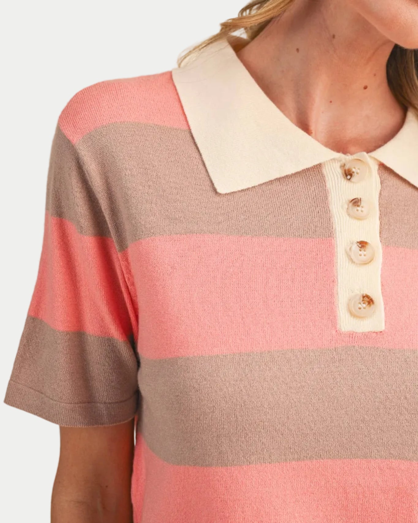 Avery Striped Sweater Knit Top in coral sand. Perfectly soft for school, running errands, weekend wear, casual days. Featured on a model with a neutral background. close up