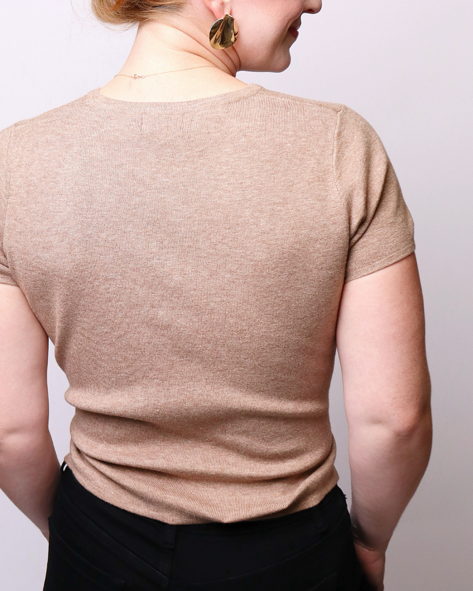 Johnnie Cross Waist Asymmetrical Hem Knit Top