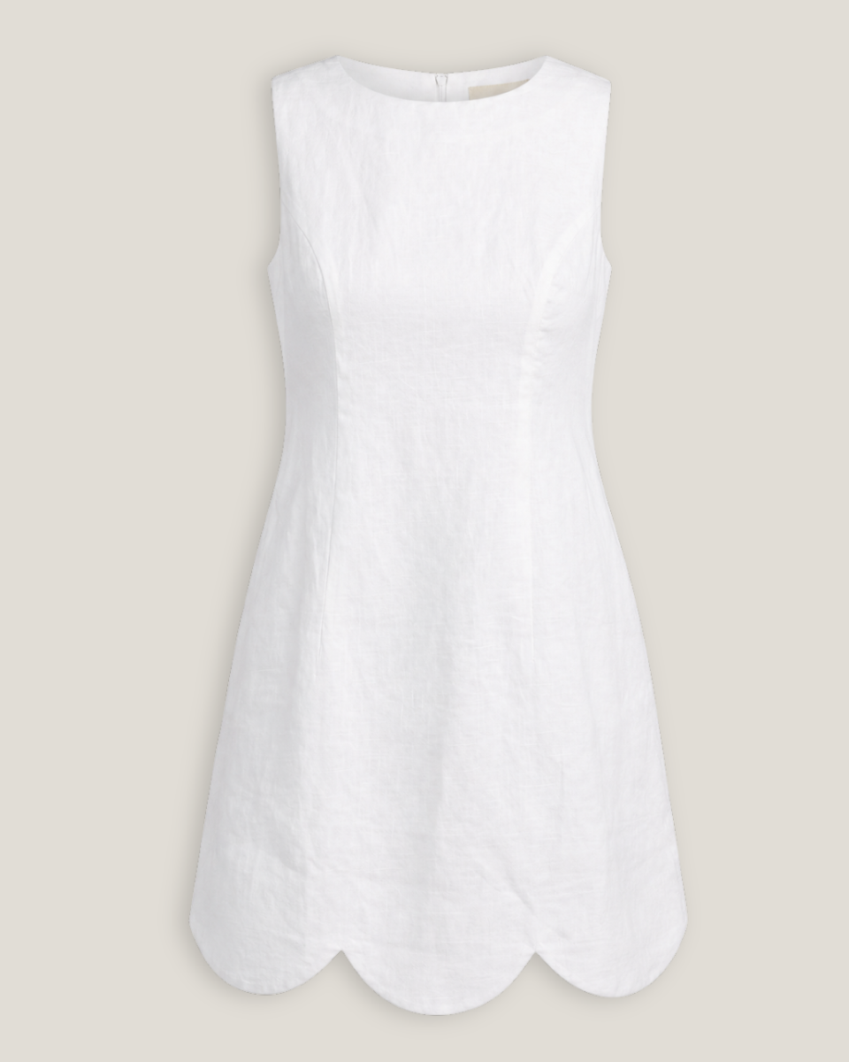 White sleeveless top on a beige background