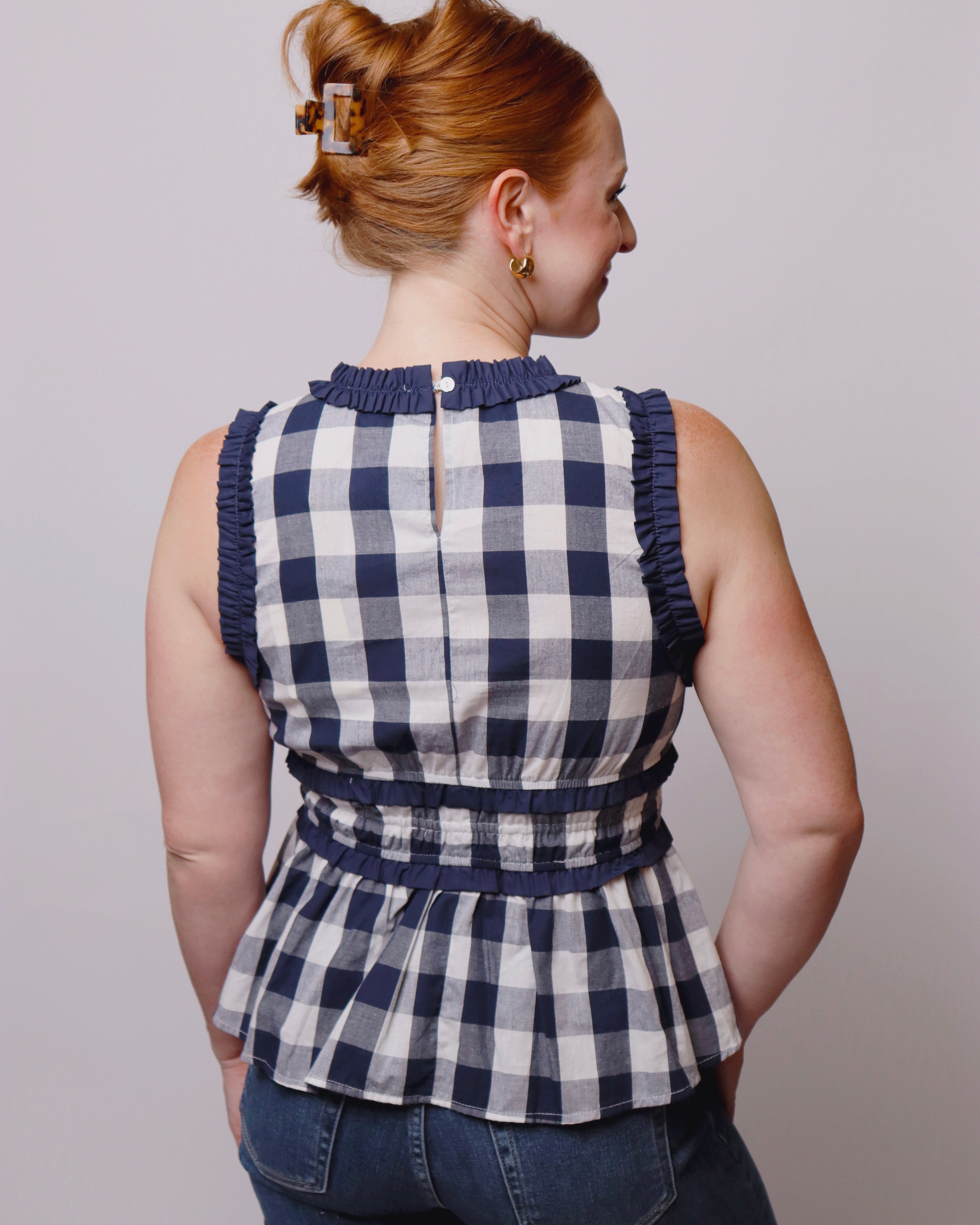 Candace Gingham Sleeveless Peplum Top in Navy