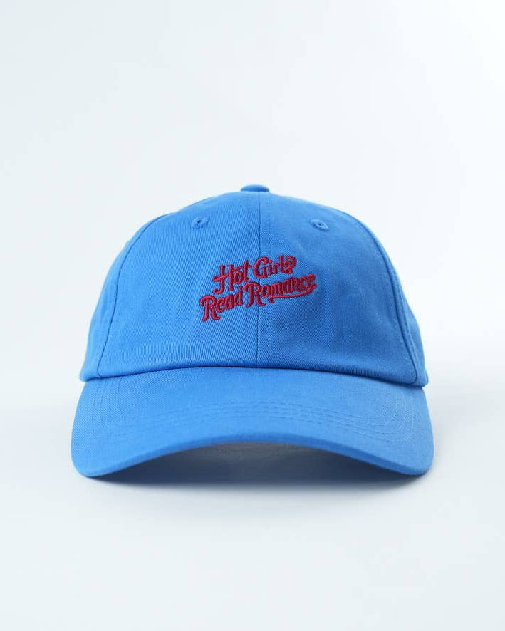 Blue cap with red text on a white background