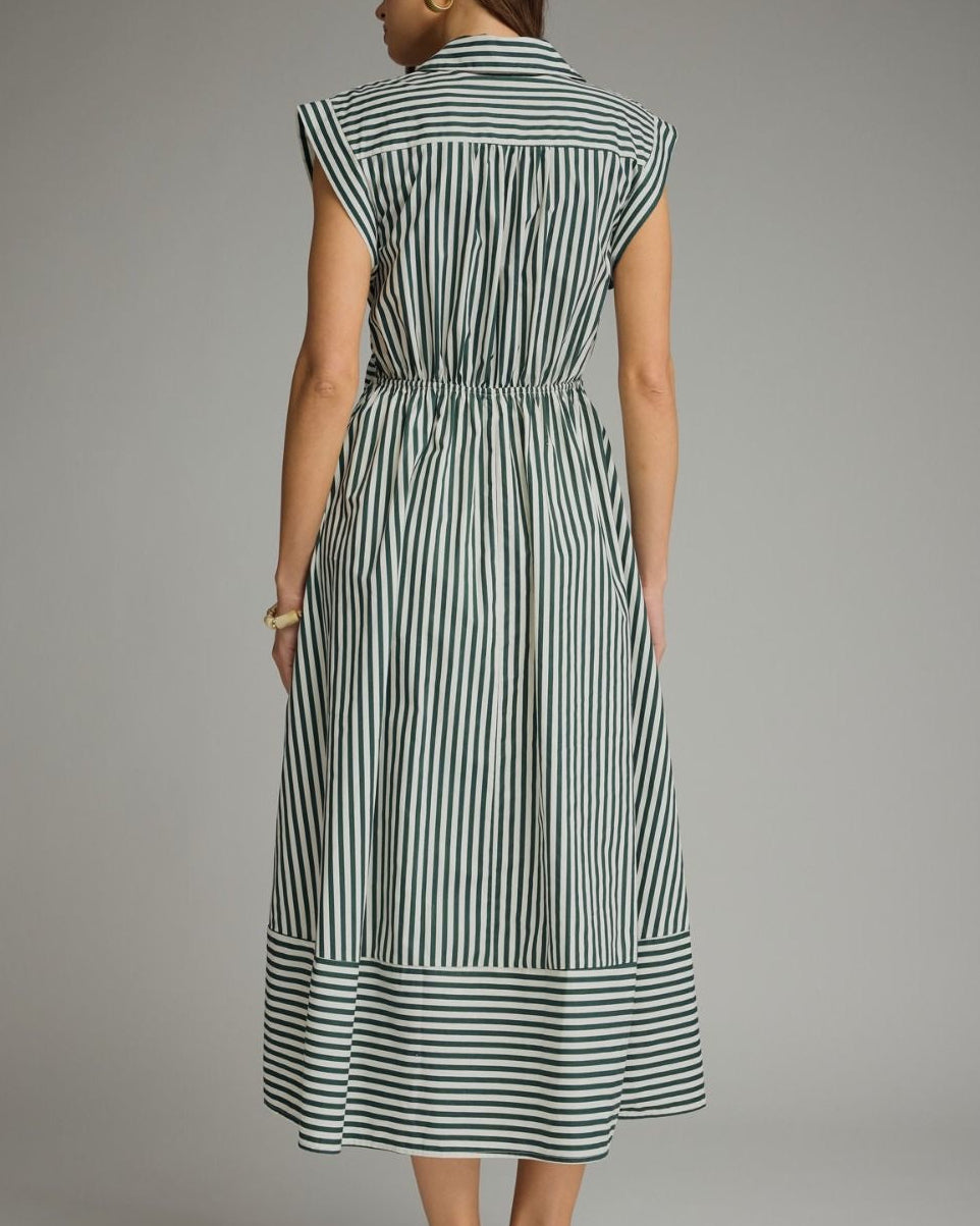 A woman modeling a capsleeve midi dress with vertical green and white stripes, a collared neckline, and a self-tie waist, photographed against a neutral studio background. back view