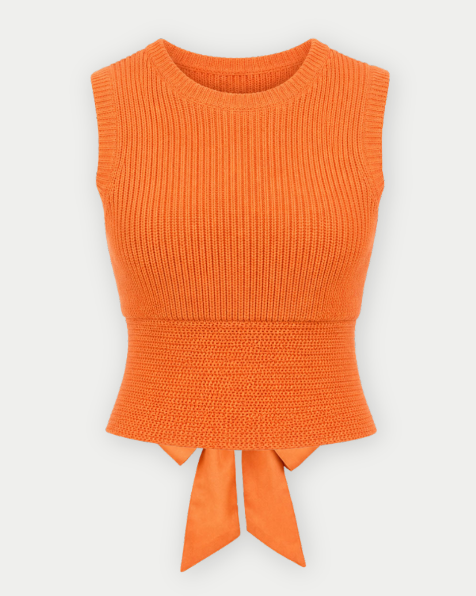An orange ribbed knit sleeveless top with a peplum hem and tied bow detail at the front, shown against a light gray background.