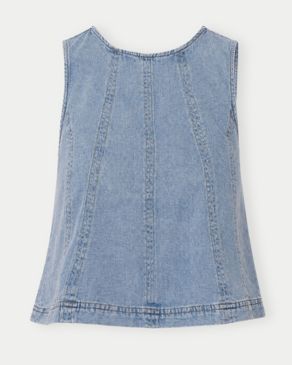 Blue denim sleeveless top on a white background
