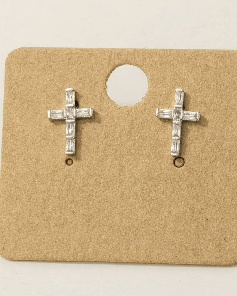 Pair of rhodium-plated cross earrings on a cardboard backing with 'Rhodium Plated' text.