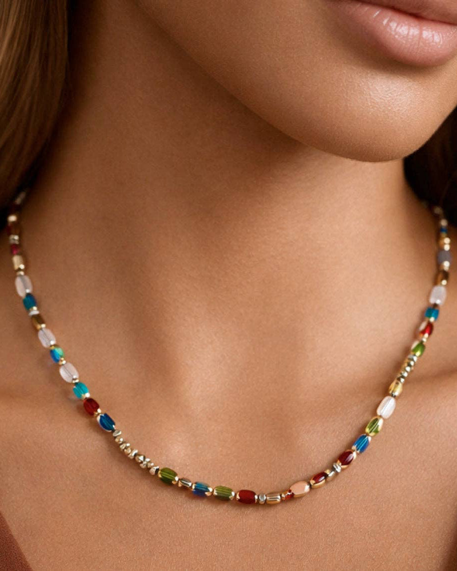 Multicolored beaded necklace on a person's neck
