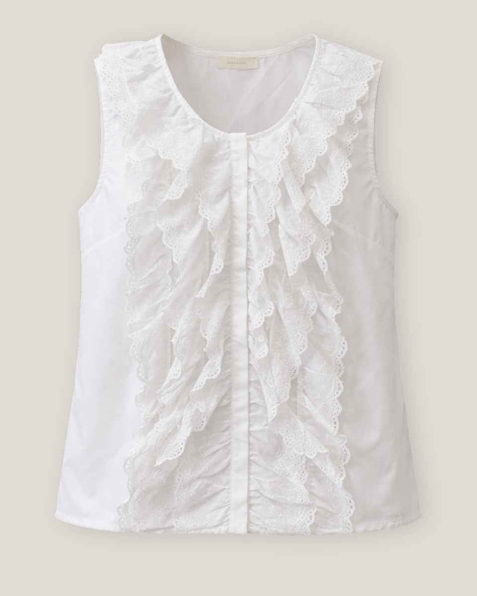 White lace sleeveless top on a beige background