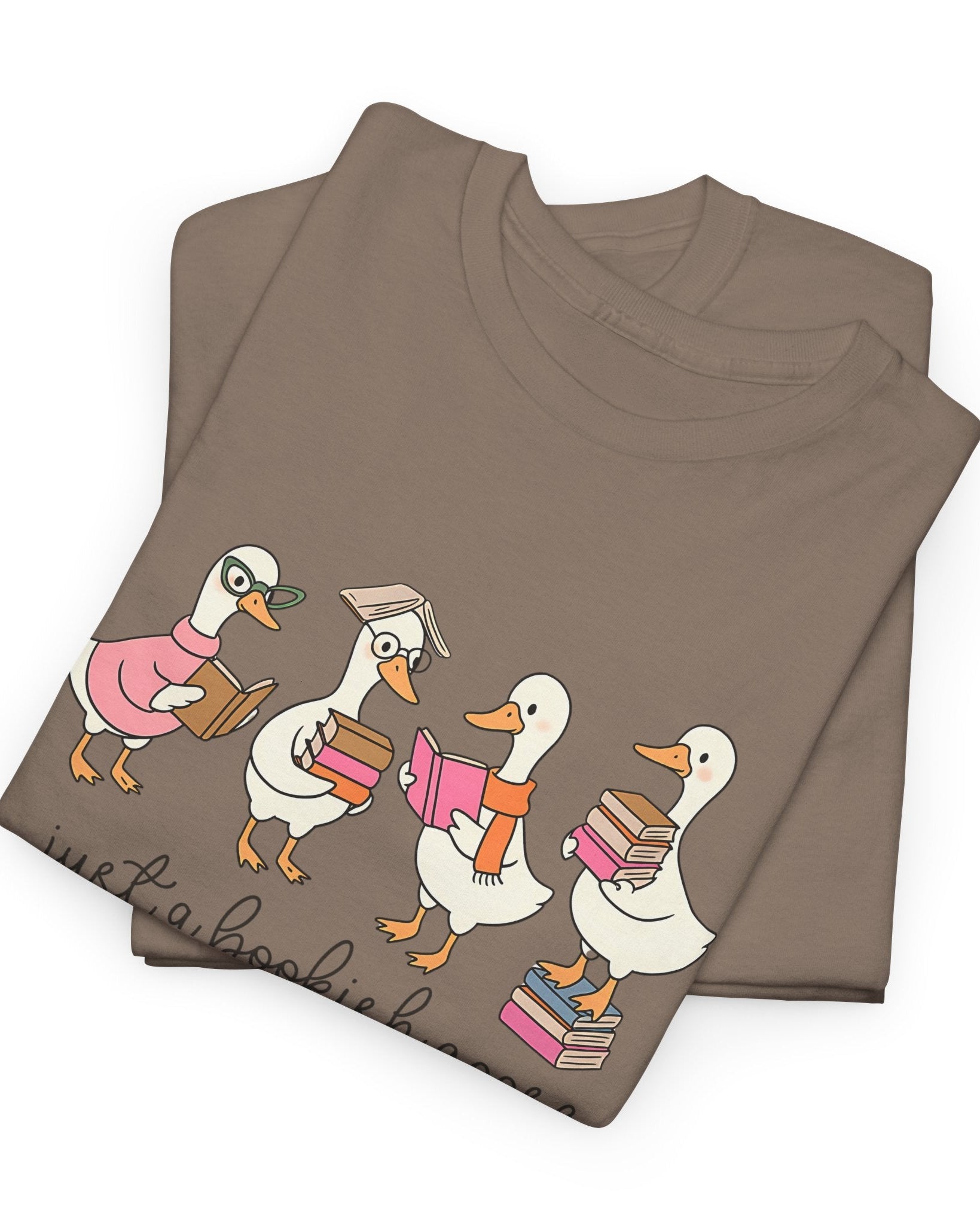 Folded brown t-shirt with cartoon geese design on a white background