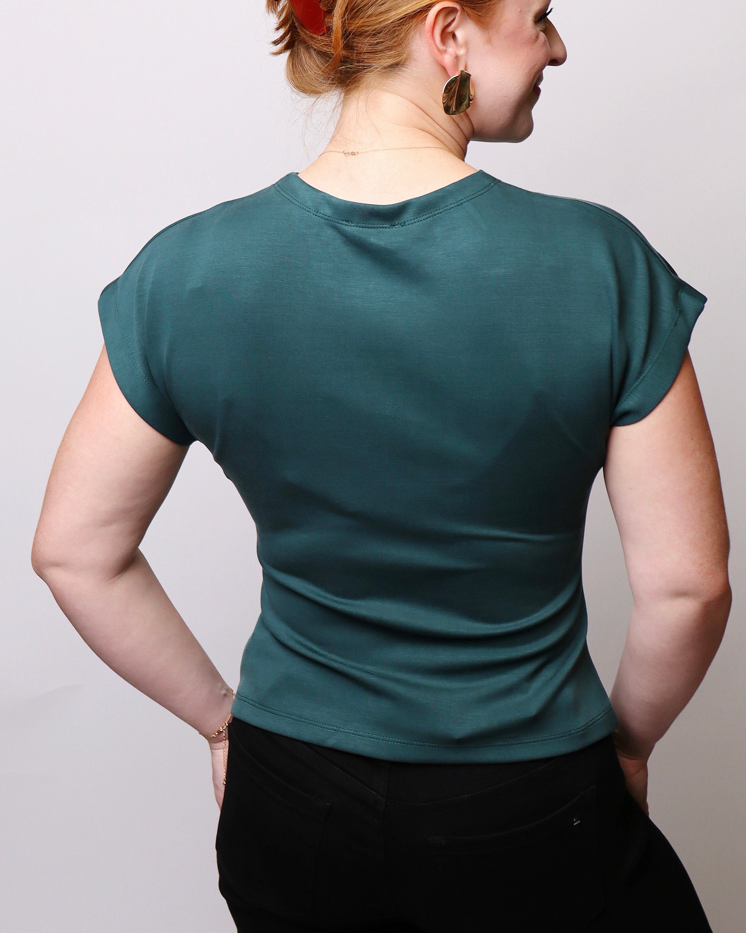 Amber Solid Cap Sleeve Knit Top with Ruched Button Detail in Hunter Green