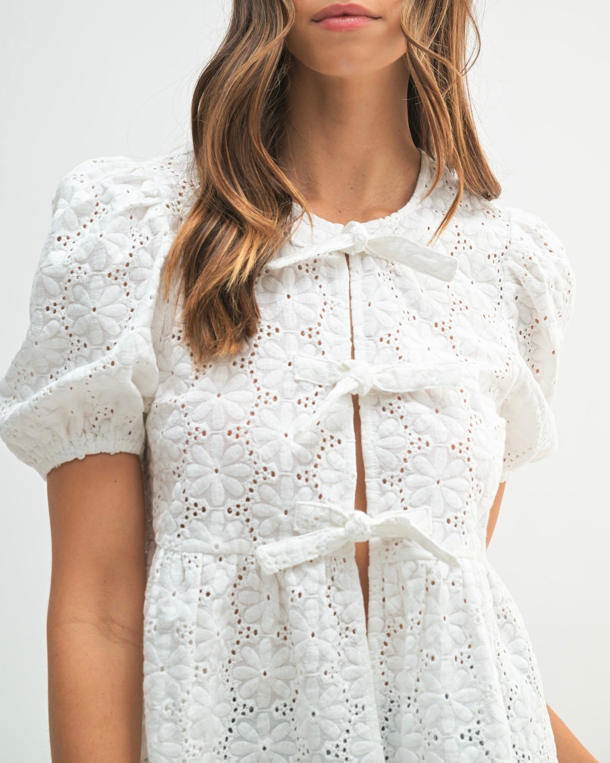 Eyelet Puff Sleeve Bottom Ruffle Front Tie Top in Off White - Blackbird Boutique