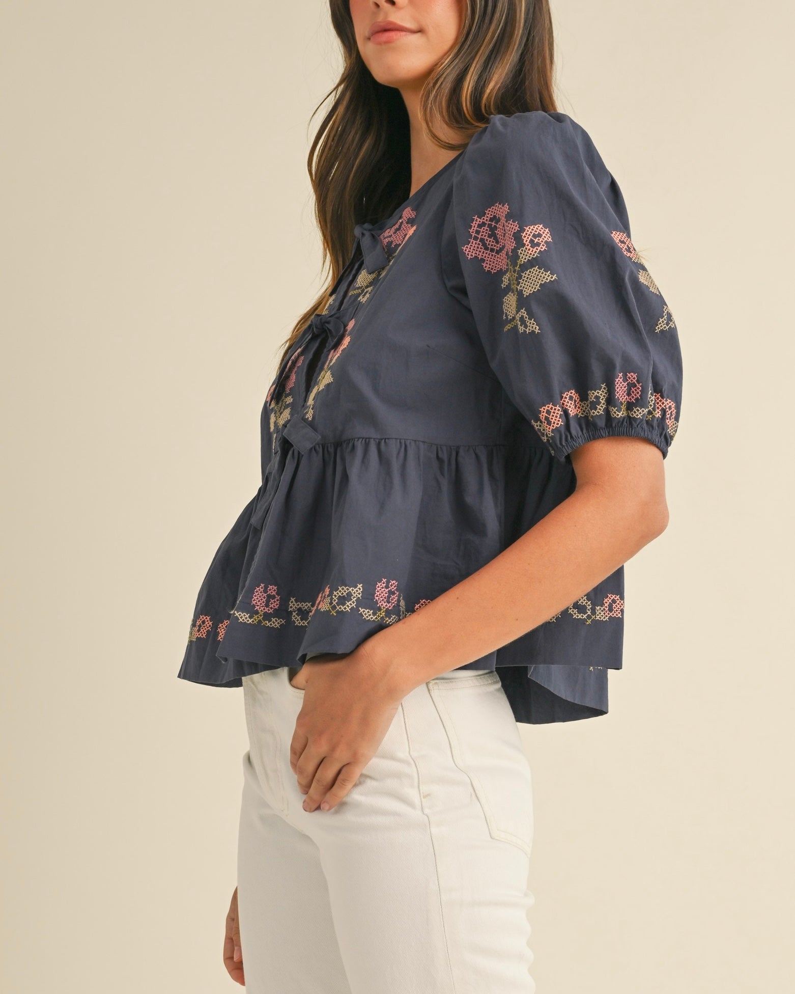 Embroidered Puff Sleeve Bottom Ruffle Front Tie Top in Navy - Blackbird Boutique