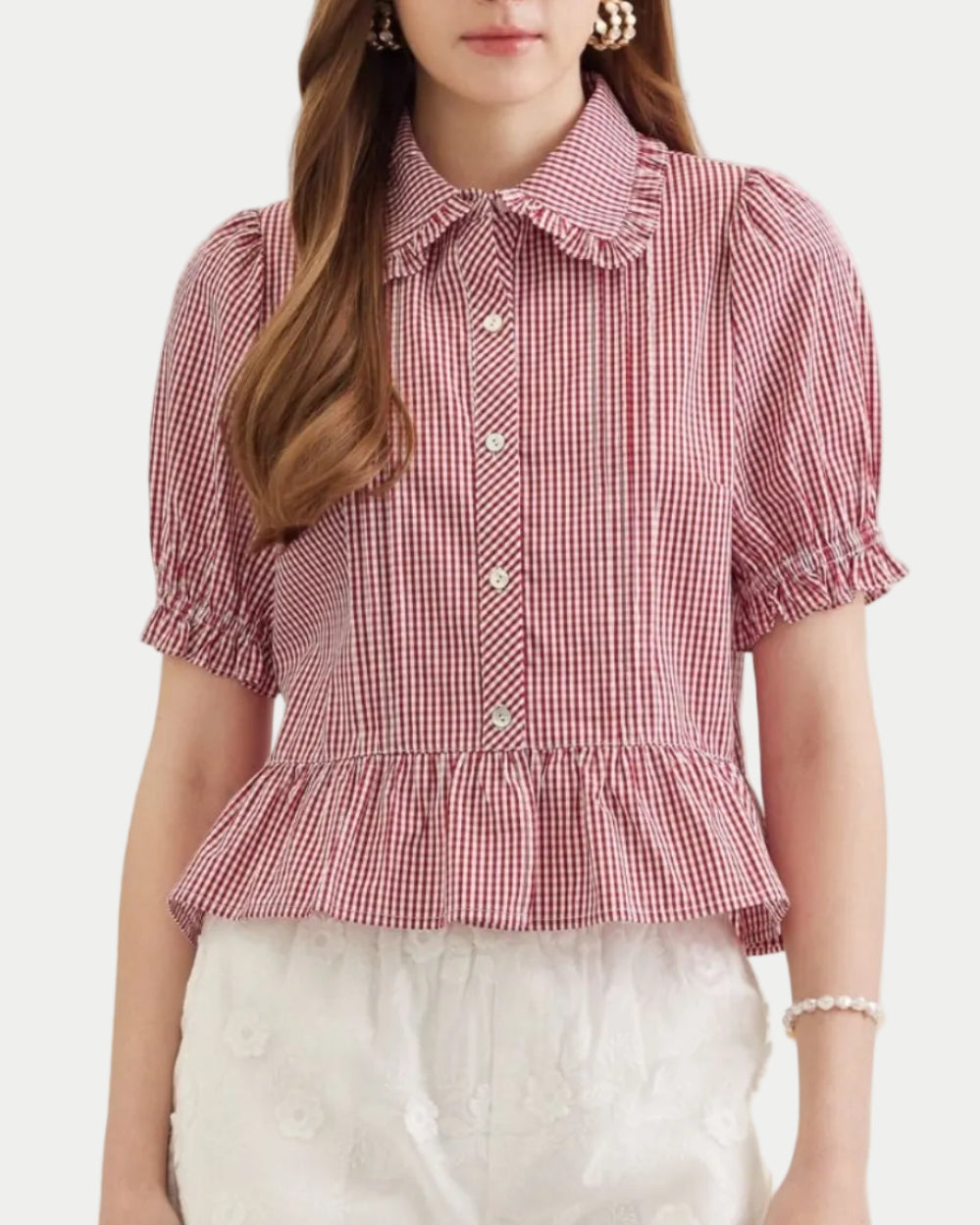Collared Red Gingham Peplum Blouse  on a model with a neutral background- Blackbird Boutique front view
