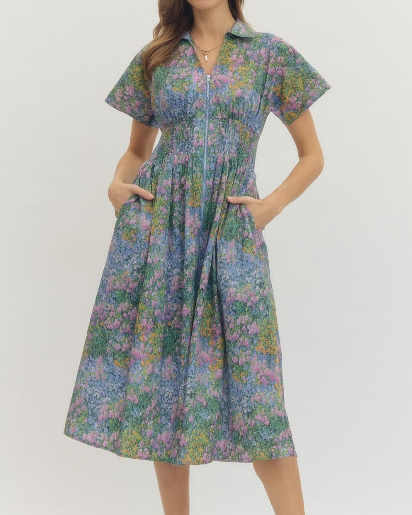 Woman wearing a floral dress on a white background