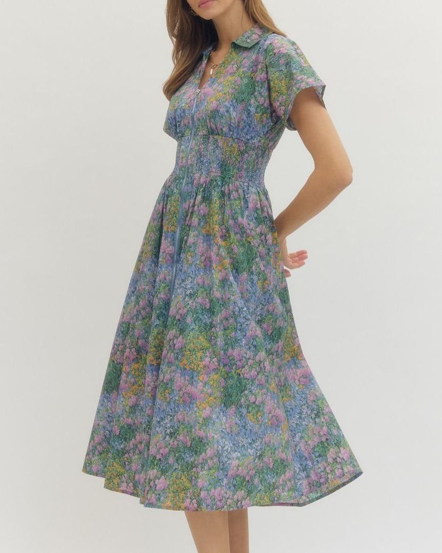 Woman wearing a floral dress on a white background