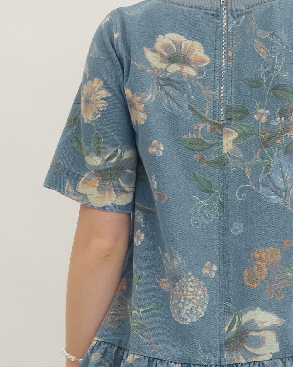 Blue floral dress with a plain background