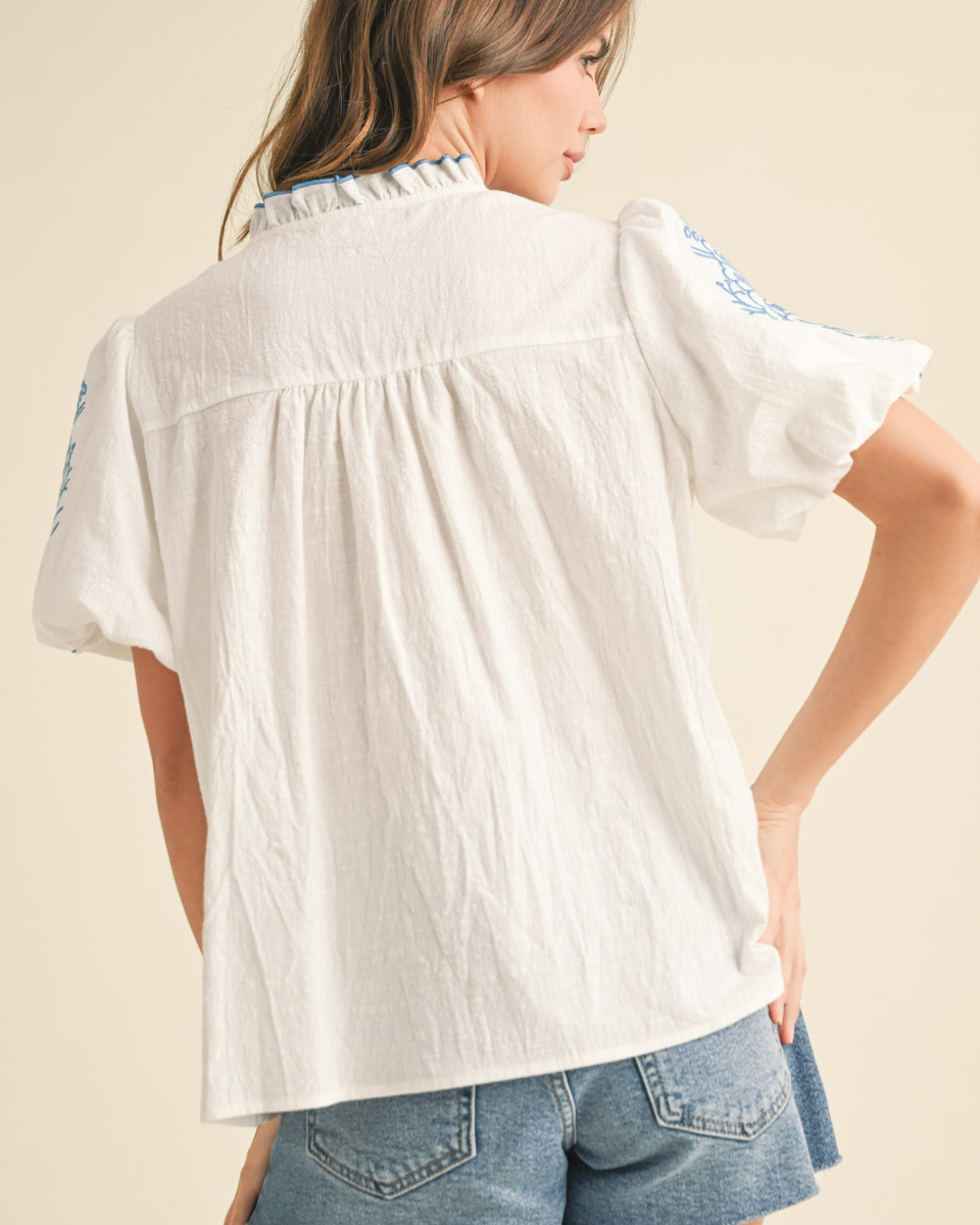 Embroidered Top With Ruffe Neckline in White/Blue