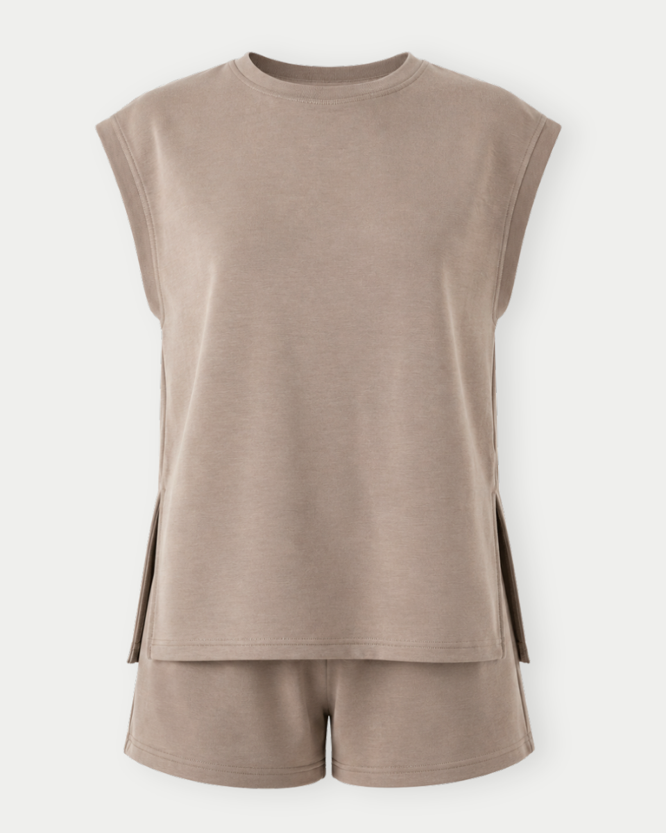 Beige sleeveless top and shorts set on a white background