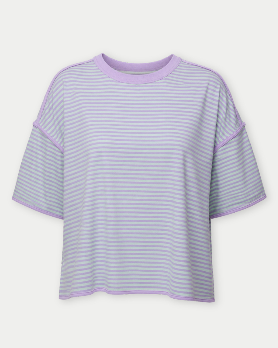 Purple and mint striped t-shirt on a light gray background