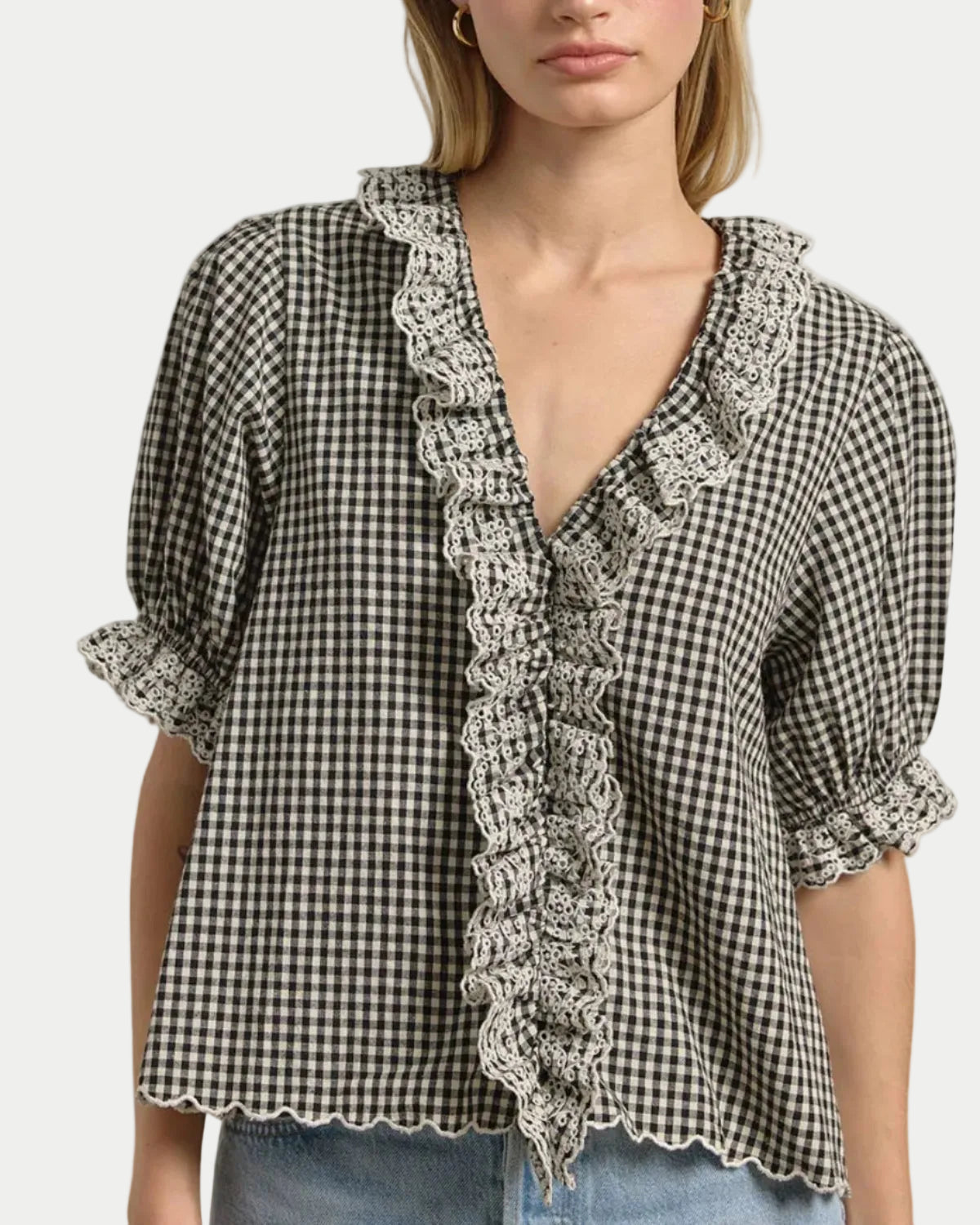 Gingham Lace Ruffle Blouse on a model with a neutral background