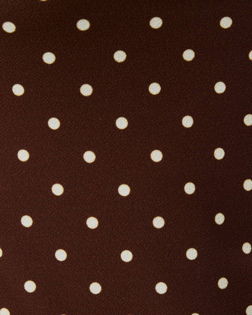 Brown fabric with white polka dots