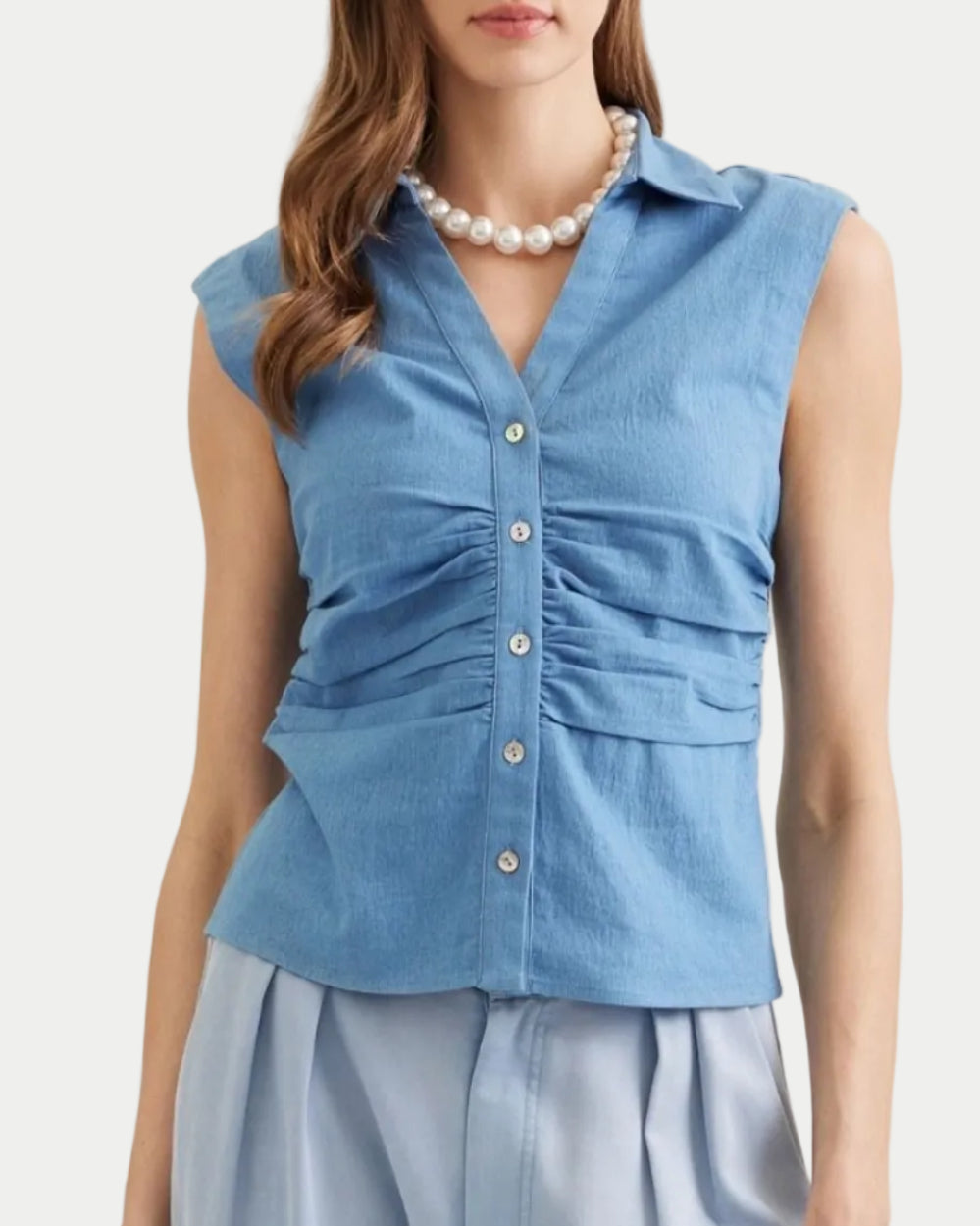 Kylie Sleeveles Stretch Denim Side Ruched Top on a model with a neutral background- Blackbird Boutique
