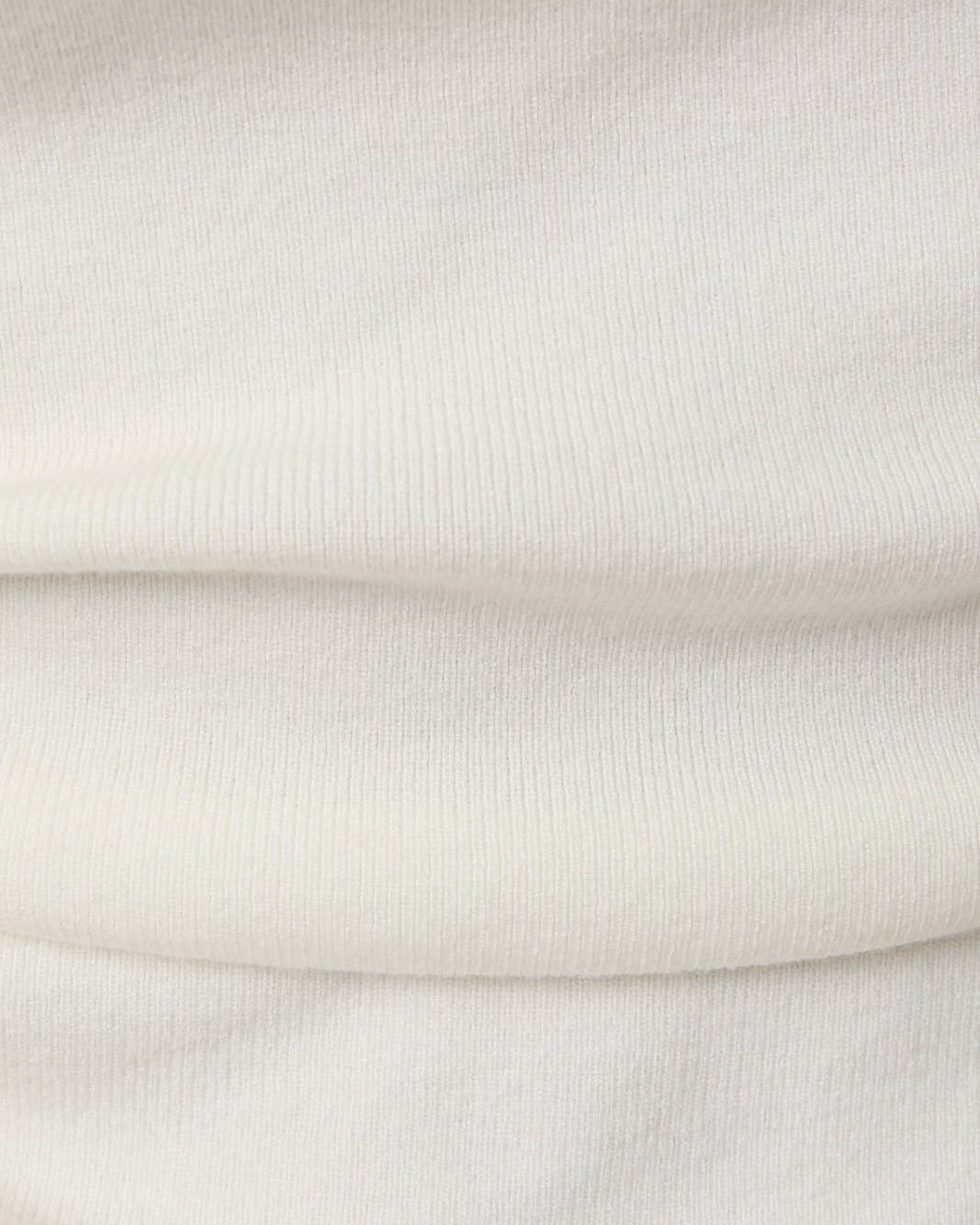 Close-up of white fabric with a subtle texture