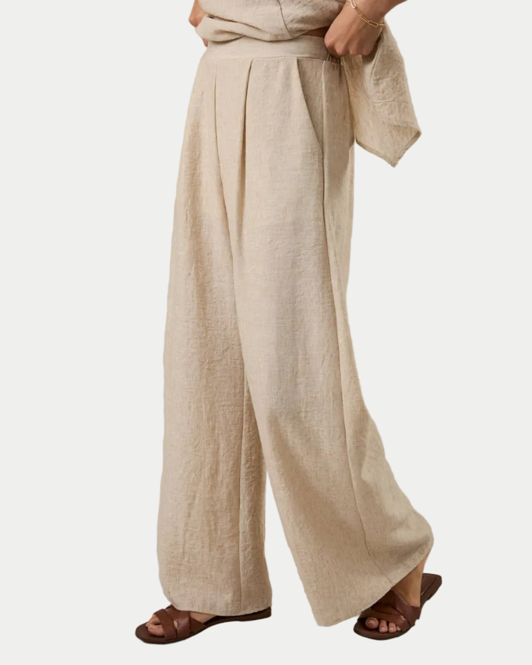 FRONT PLEAT DETAIL BACK WAIST ELASTIC WIDE LEG PANTS - Pockets.  Perfect for date night, summer parties, Graduation guest,  side view -  Blackbird Boutique