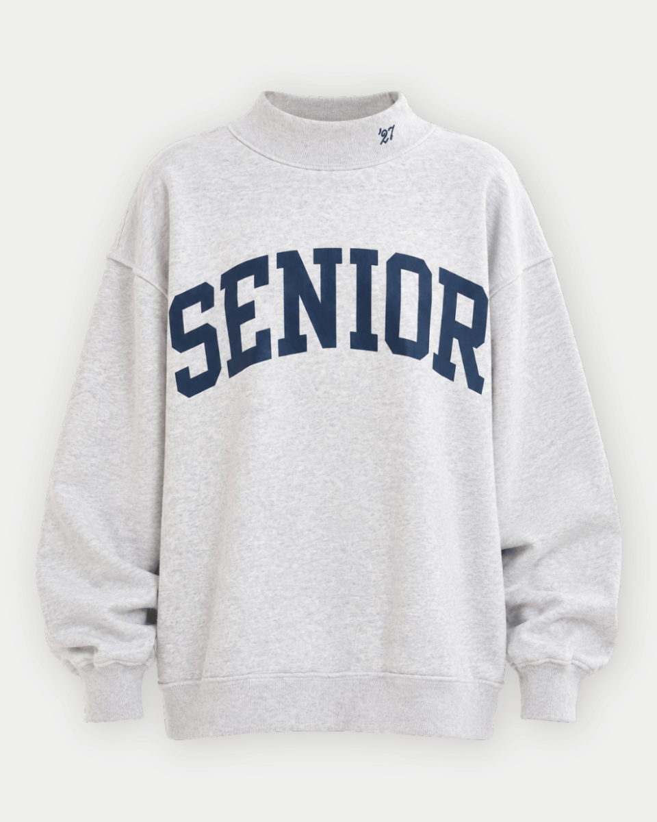 A light heather gray crewneck sweatshirt featuring the word 'SENIOR' printed across the chest in navy blue varsity block letters, shown against a light gray background.