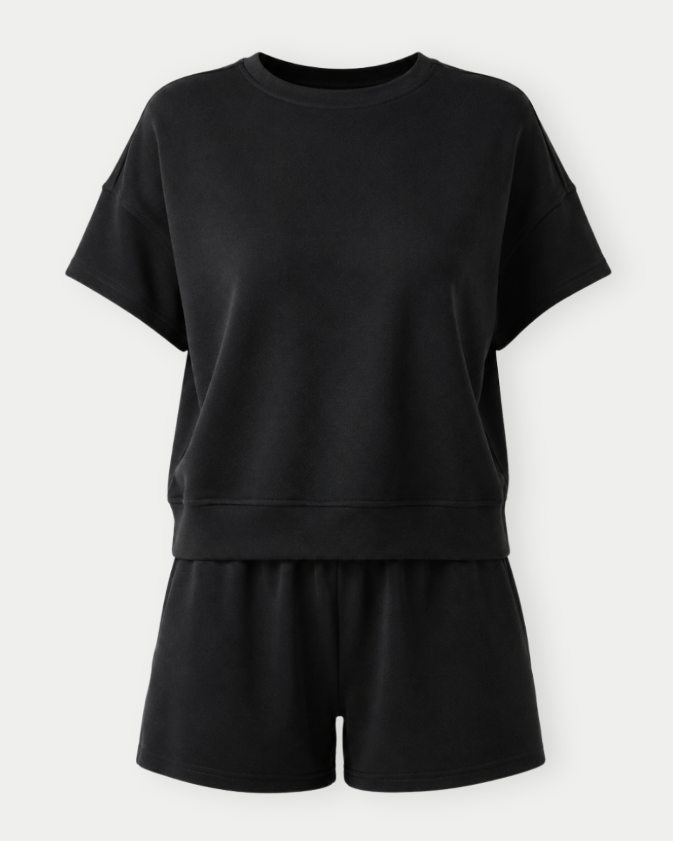 Black oversized t-shirt and shorts set on a white background