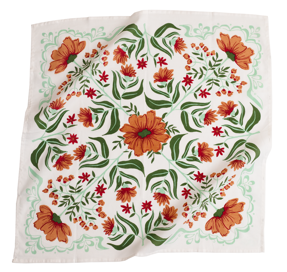 Floral patterned fabric with orange and red flowers on a white background