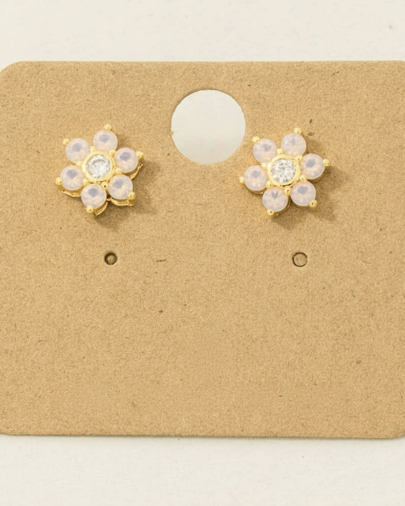 Pair of gold-dipped flower-shaped earrings on a cardboard backing with '18K Gold Dipped' text.